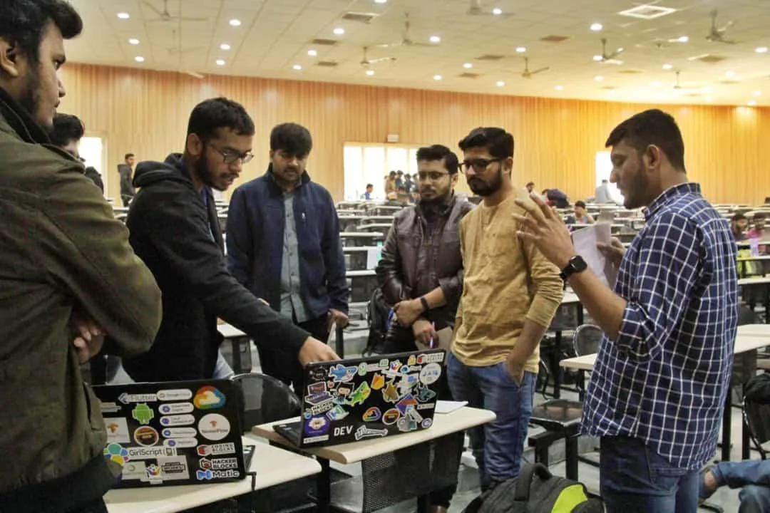 Project review with the team during Hack Infinity 2.0