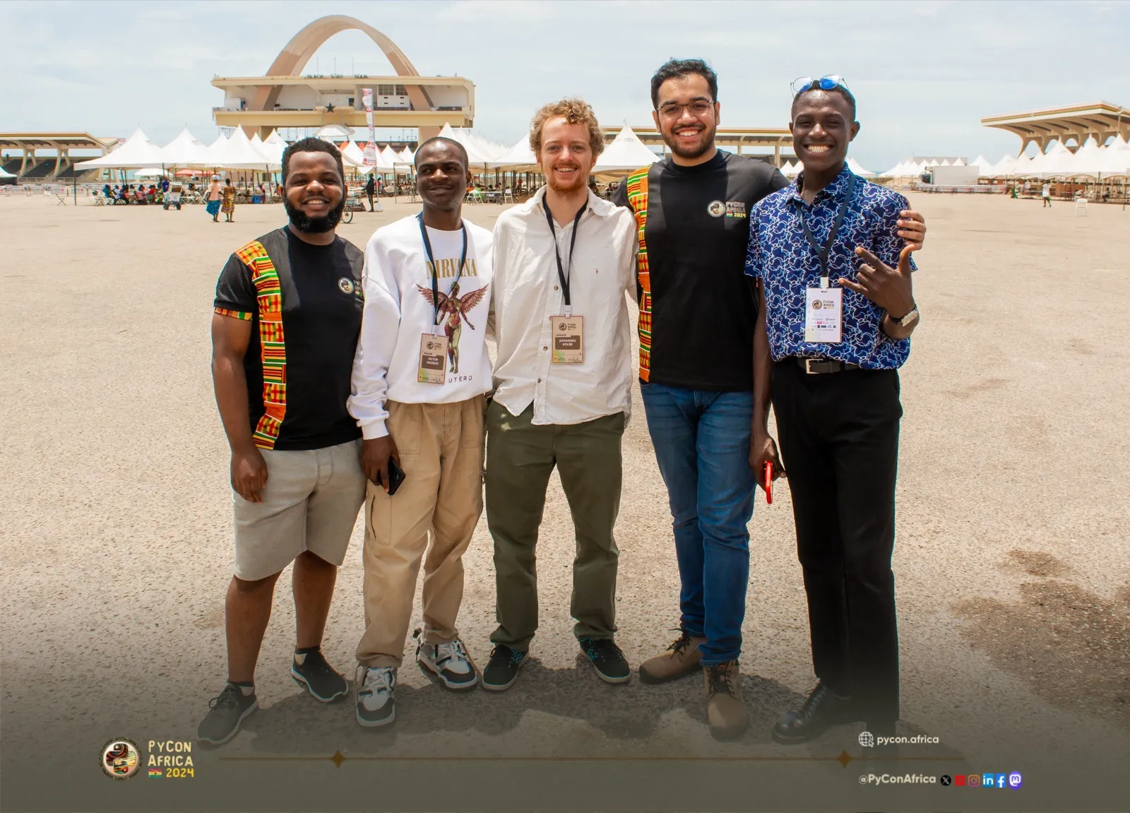 Speakers at Independence Square, Accra — the Black Star Gate in the background